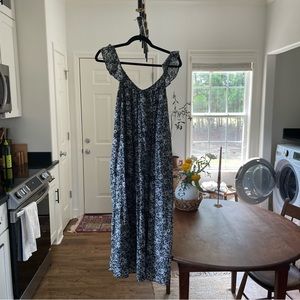 navy and white LOFT maxi dress with flutter sleeves and pockets